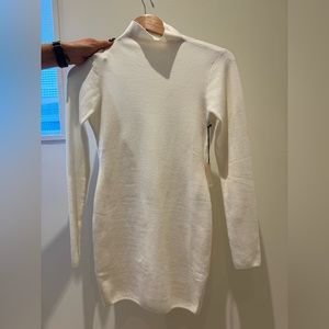 White, long sleeve, turtleneck, backless dress. Never worn. Size XS. NWT